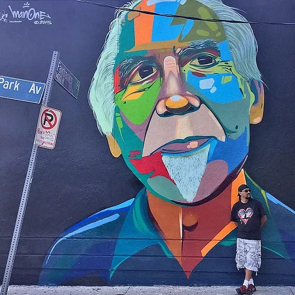 STREET ART : In addition to painting outdoor murals in urban spaces, artist Man One also paints live at concerts and has even led workshops abroad to help foster self-esteem and respect in young artists. - PHOTO COURTESY OF MAN ONE