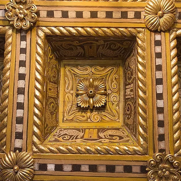 IT’S ALL IN THE DETAILS: Ornate, gilded ceilings like this one adorn many of the rooms at Hearst Castle. - PHOTO BY JAYSON MELLOM
