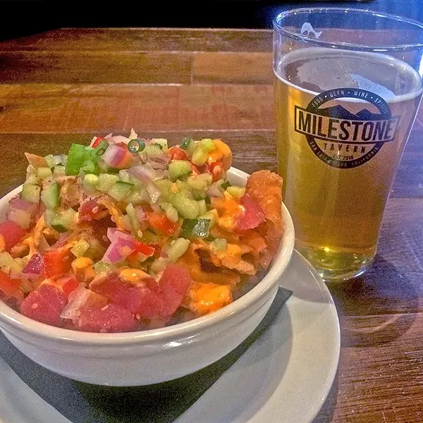 POKE GALORE: The ahi poke nachos, paired with Barrelhouse’s mango IPA, were on point. - PHOTO BY RYAH COOLEY