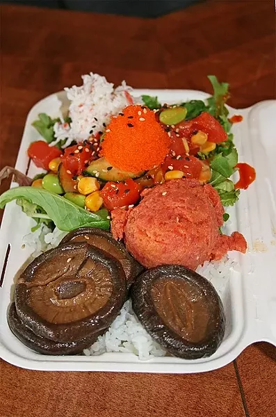 PICK YOUR OWN : Choose your own poke bowl at Poke Chef off California Boulevard. Pictured, tender shiitake mushrooms, rice, crab, roe, and spicy tuna converge on a bed of fresh lettuce. - PHOTO BY HAYLEY THOMAS