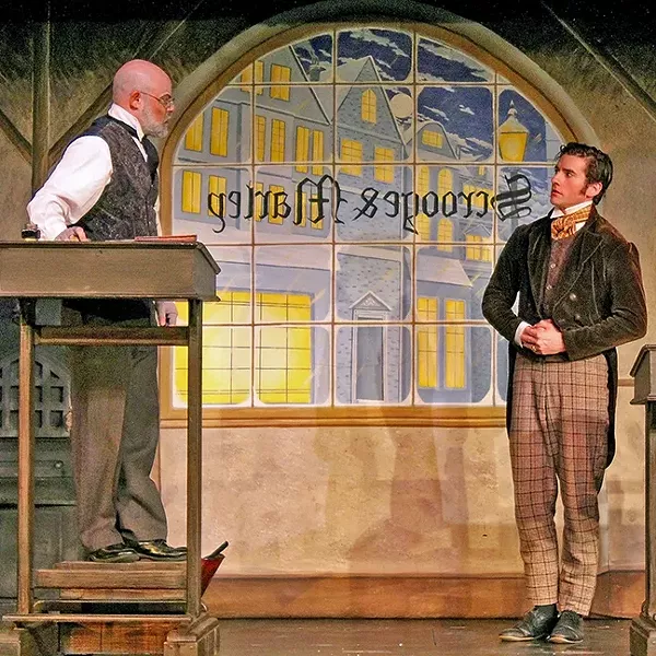 BAH HUMBUG!: Ebenezer Scrooge (Beau Heckman) is the cold-hearted miser who berates the hard-working family man Bob Cratchit (Jeff Salsbury) in the Great American Melodrama’s production of Charles Dickens’ 'A Christmas Carol.' - PHOTO COURTESY OF THE GREAT AMERICAN MELODRAMA