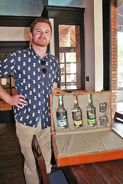 WISH THEY ALL COULD BE CA BOOZE: As the descendant of a family of moonshiners and an avid home distiller-turned-pro, Aaron Bergh has poured his heart and soul into making unique craft spirits that are distinctly “California style.” - PHOTO BY HAYLEY THOMAS