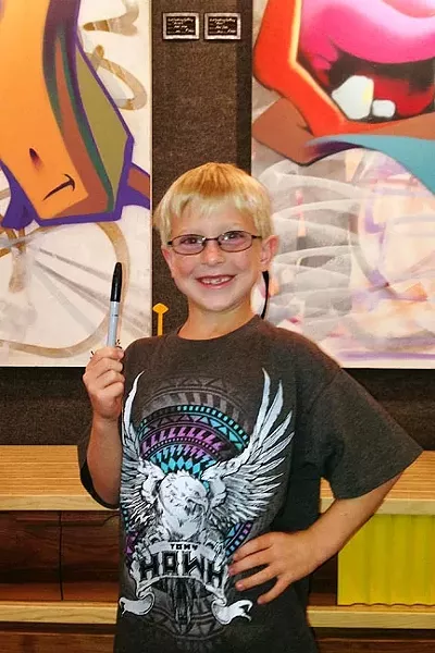 WHEN THE STUDENT’S READY, THE TEACHER APPEARS: Local boy and artist Dylan Ehmke has been a fan of the famous street artist Man One for years. - PHOTO COURTESY OF JUST LOOKING GALLERY