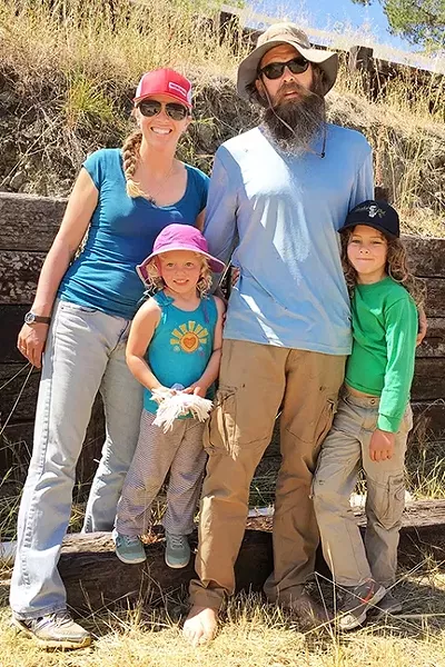 LIVE OAK OR BUST!: The Newman family—(left to right) Korie, Acacia (3), Todd, and Rohn (6)—are heading to KCBX fundraiser the Live Oak Music Festival, on June 16 through 18, at Camp Live Oak off Highway 154. - PHOTO BY GLEN STARKEY
