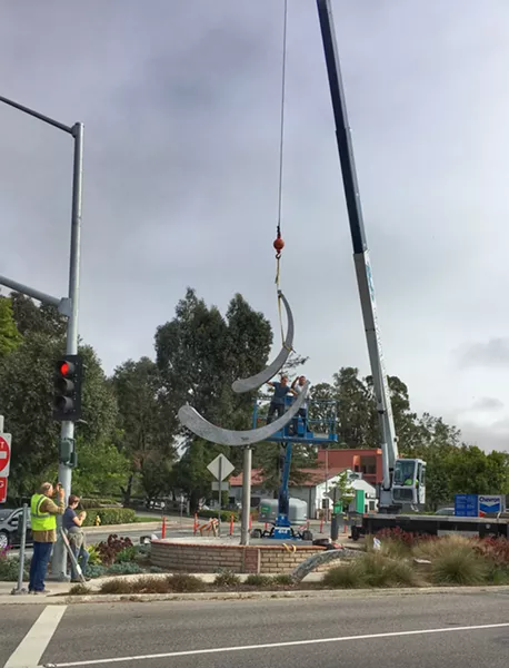 INSTALLATION Sculptor Jeffery Laudenslager's monumental kinetic sculpture Olas Portola is installed in SLO Town on June 9. - PHOTO BY GLEN STARKEY