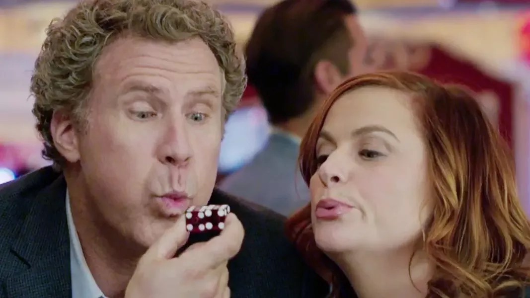 RISKY BUSINESS Two financially strapped parents (Will Ferrell and Amy Poehler) start a secret casino in a friend's basement to pay for their daughter’s college tuition in The House. - PHOTO COURTESY OF WARNER BROS. PICTURES
