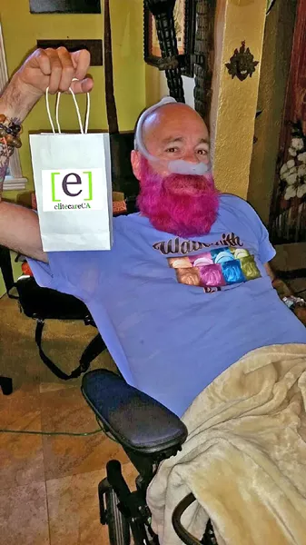 ACCESS SUCCESS Arroyo Grande resident Devin Ward became the first resident to receive a medical marijuana delivery from the city’s first officially permitted mobile service, Elite Care Enterprises. - PHOTO COURTESY OF ELITE CARE ENTERPRISES
