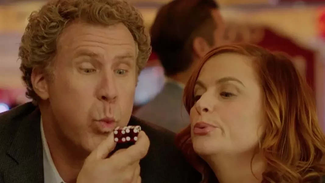 RISKY BUSINESS Two financially strapped parents (Will Ferrell and Amy Poehler) start a secret casino in a friend's basement to pay for their daughter's college tuition in The House. - PHOTO COURTESY OF WARNER BROS. PICTURES