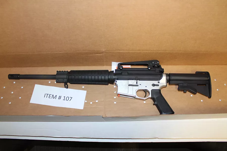 DEADLY FIREPOWER This AR-15-style rifle was one of several guns reportedly kept by the drug trafficking organization. - PHOTO COURTESY OF SLO COUNTY SHERIFF'S OFFICE