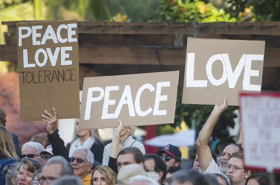 A CALL FOR PEACE SLO County residents packed Mission Plaza to stand in solidarity against hate as part of a "outshine the darkness" rally Aug. 12. - PHOTO BY JAYSON MELLOM