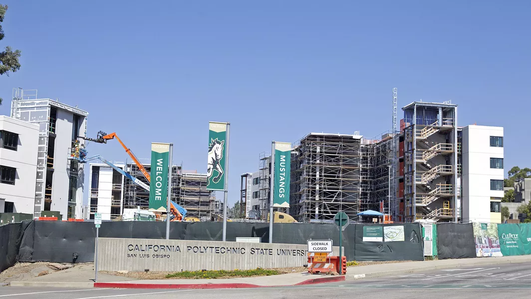 NOT READY YET These Cal Poly dorms under construction will not be ready to house the 800 to 850 more students the university's taking on than it expected this year. - PHOTO BY JAYSON MELLOM