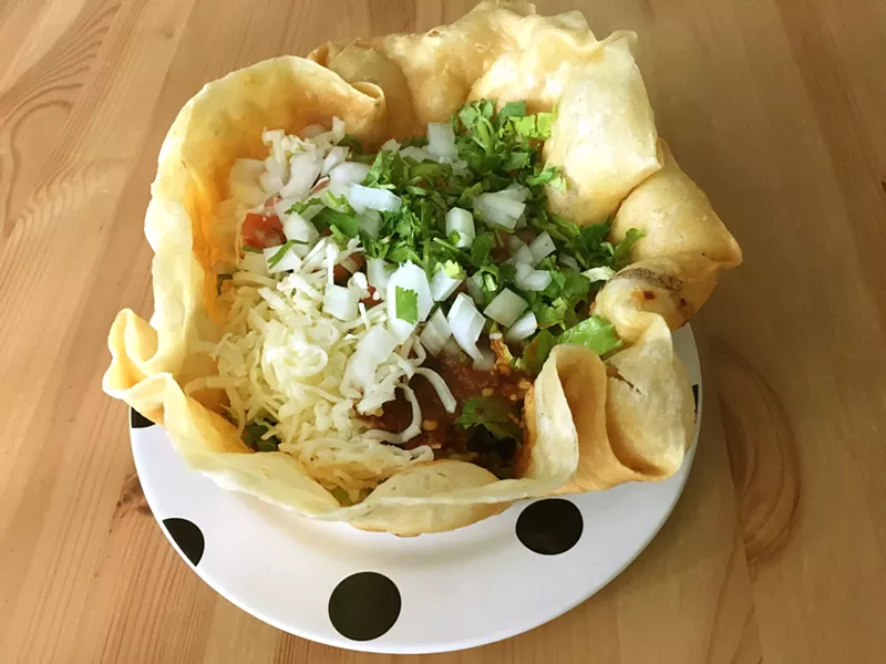 STEAL For just $8 and change the taco salad does not disappoint, the carne asada has just the right amount of seasoning and salsa to treat your taste buds at Chilie Peppers. - PHOTO BY KAREN GARCIA