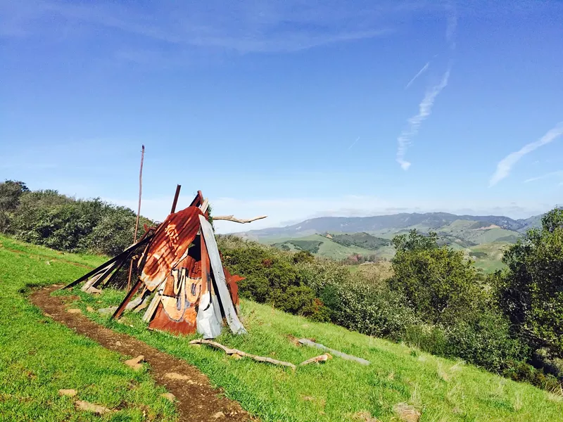RANDOMNESS The hike up the Reservoir Canyon Trail is more than just an uphill climb. You can find a metal teepee, a tree swing, and a stone bench along the way. - PHOTO BY CAMILLIA LANHAM