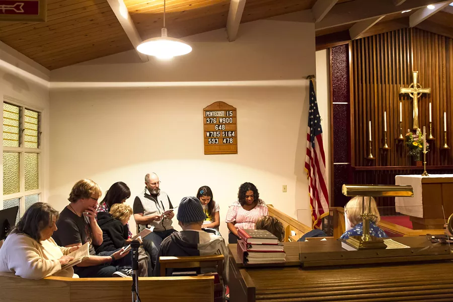 PRACTICE Anita Schwaber of By the Sea Productions (far left) and cast members read a script for their upcoming play, Member of the Wedding, at St. Peter's By The Sea Episcopal Church in Morro Bay. - PHOTO BY JAYSON MELLOM