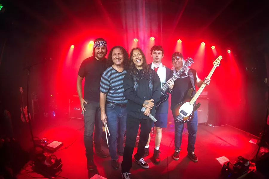 ROCK SALUTE! High Voltage—A Tribute to AC/DC will recreate AC/DC's incredible rock anthems on Nov. 18, at The Pour House. - PHOTO COURTESY OF HIGH VOLTAGE