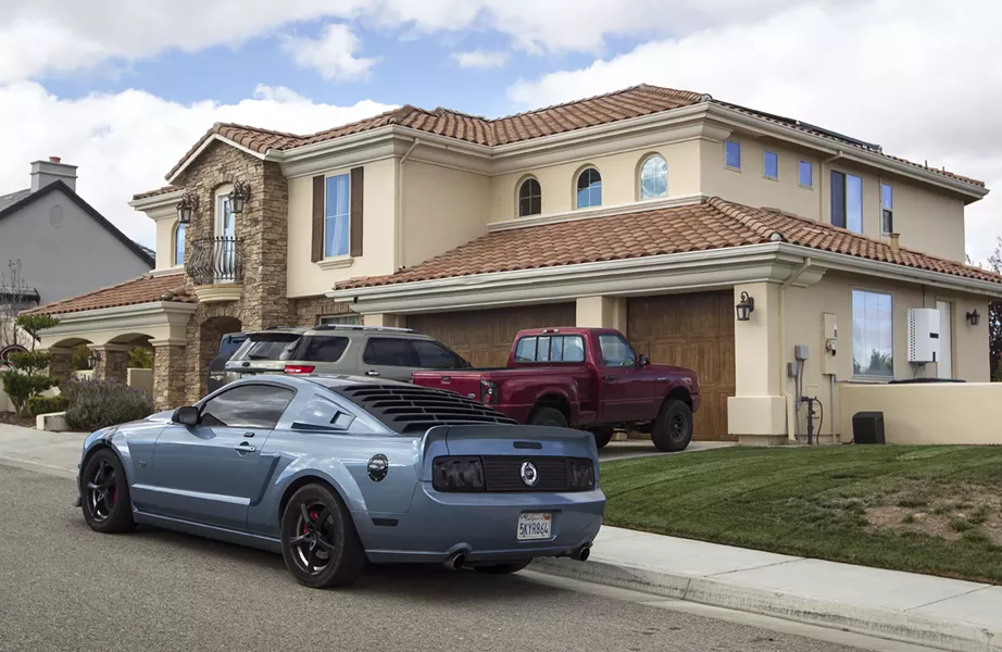 LAP OF LUXURY Multi-millionaire lotto winner Charles Hairston gifted this $819,000 home and a 2016 Porsche to Tiffany Borba, an unlicensed caregiver who now has power of attorney over his finances and medical care. - PHOTO BY JAYSON MELLOM