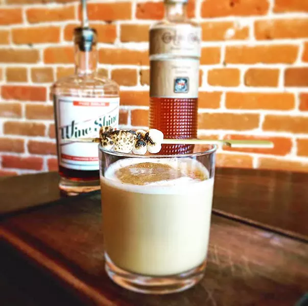 LOCALLY-CRAFTED MARVEL At Hatch Rotisserie, Robin Wolf is crafting lovely winter wonders like this concoction containing bourbon, sweet potato liqueur, Paso Wine Shine, molasses, cream, and holiday spice, with a brûlée marshmallow. - PHOTO COURTESY OF ROBIN KIRK WOLF
