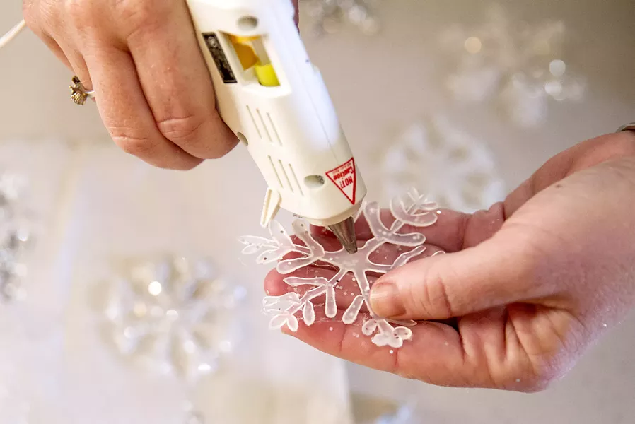 JUST GLUE IT Turns out it's easy to fail at Pinterest, but sometimes you can win, too. Or you can do both by crafting snowflakes out of hot glue, Modge Podge, and glitter. - PHOTO BY JAYSON MELLOM