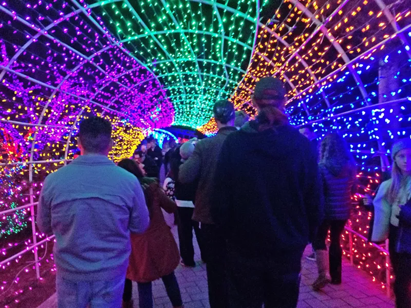 MERRY AND BRIGHT The tunnel of lights at the V.C. Cambria Christmas Market is a popular spot for photos and is the inspiration for many a festive Instagram post. - PHOTO BY RYAH COOLEY