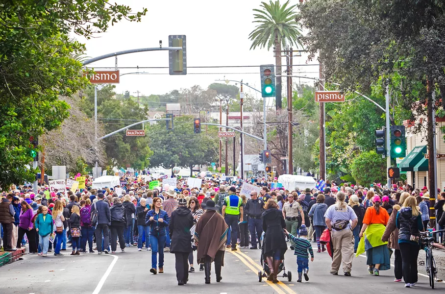 STILL FIGHTING The Women's March SLO will hold a "hear our vote" rally on Jan. 20, just one day short of the one-year anniversary of the organization's 2017 march. - FILE PHOTO BY JAYSON MELLOM