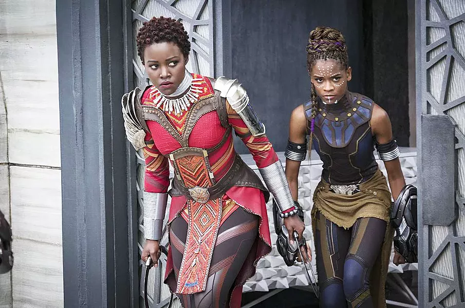 POWERFUL WOMEN Nakia (Lupita Nyong'o, left) and Shuri (Letitia Wright) join in the fight for Wakanda, proving themselves equal to men. - PHOTO COURTESY OF MARVEL STUDIOS AND WALT DISNEY PICTURES