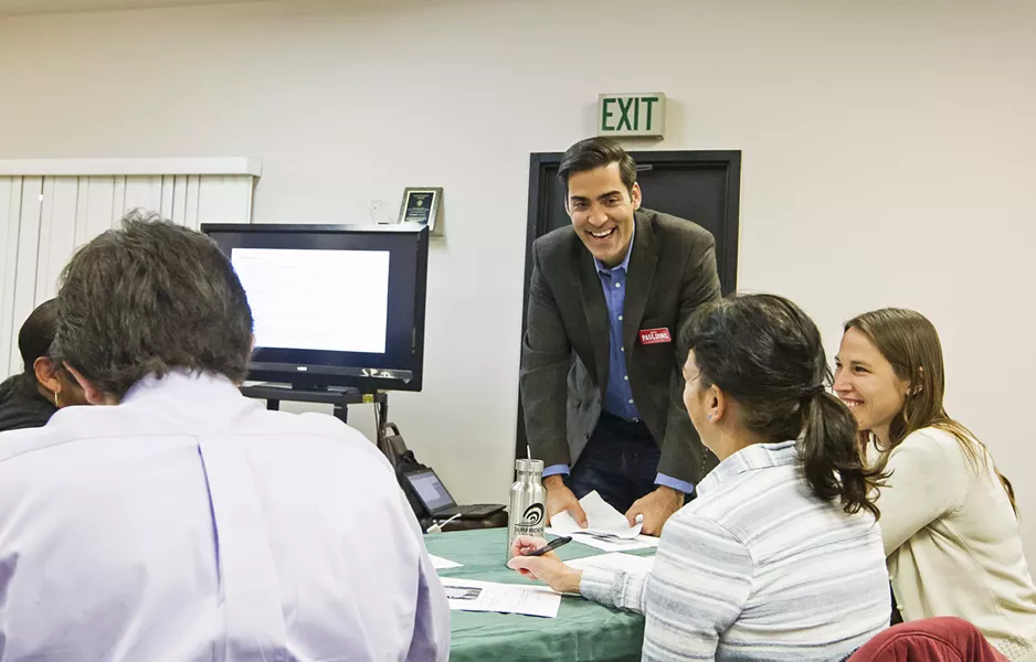 GRASSROOTS CAMPAIGNING Fourth District Supervisor candidate Jimmy Paulding chats with constituents attending an Oceano community workshop on Feb. 20. - PHOTO BY JAYSON MELLOM