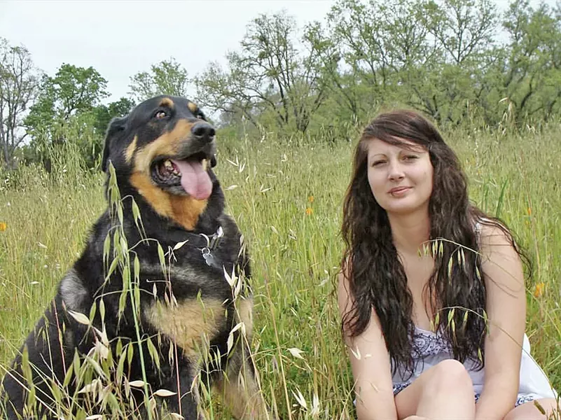 MAN'S BEST FRIEND Amber Davis said that while her CASA mentor was her savior, her dog Capone really helped her through the toughest times in her life. - PHOTO COURTESY OF AMBER DAVIS