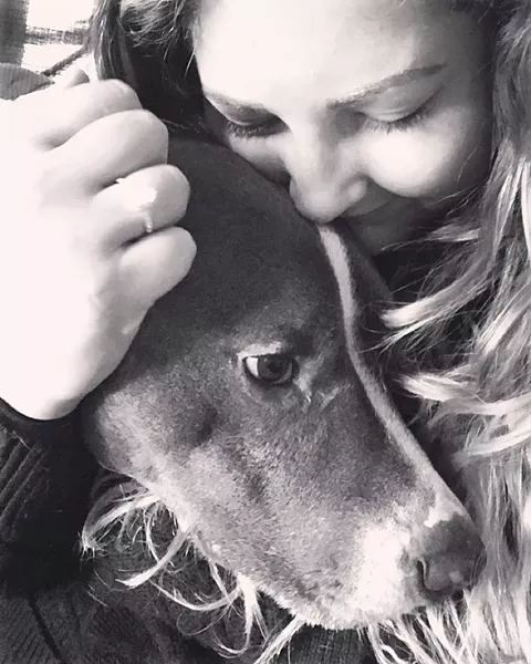 FAMILY MATTERS There is a lot more love in Davis' life, but her No. 1 love is her pit bull Diesel. - PHOTOS COURTESY OF AMBER DAVIS