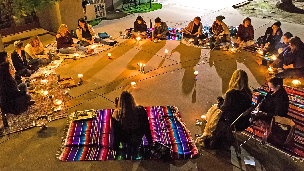 CIRCLE OF SISTERHOOD Women gather behind the Tamed Wild Apothecary in Arroyo Grande to welcome the full moon, set intentions, and enjoy - PHOTO BY JAYSON MELLOM
