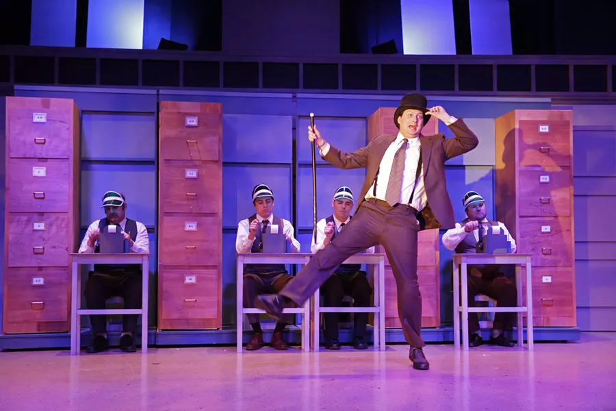 DREAM BIG, KID Emboldened by his dreams of becoming a Broadway producer, Leo Bloom (Toby Tropper, center) finally leaves his miserable accounting job and tyrannical boss behind in SLO Repertory Theatre's production of The Producers this February. - PHOTO COURTESY OF RYLO MEDIA DESIGN