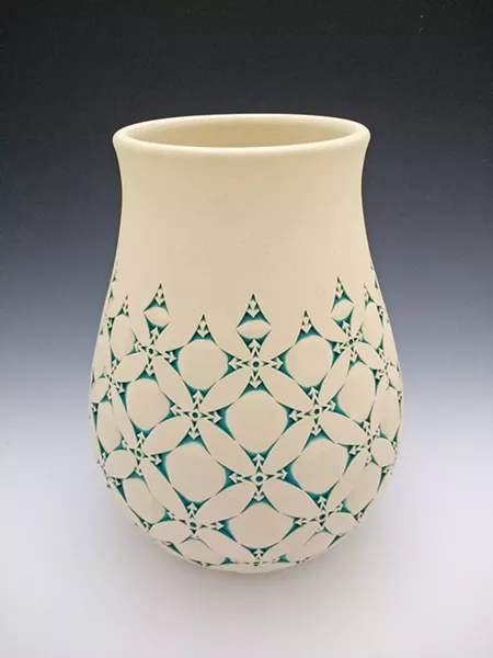 DETAILS The designs on each of Kenny Standhardt's pieces, like Floral Vessel, are done by hand, meaning no two are exactly the same. - PHOTO COURTESY OF KENNY STANDHARDT