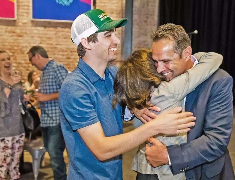 VICTORY SLO County Sheriff Ian Parkinson celebrates with his family after preliminary election results show him winning a third term. Parkinson faced a difficult and acrimonious campaign against his challenger, local private investigator Greg Clayton. - PHOTO BY JAYSON MELLOM