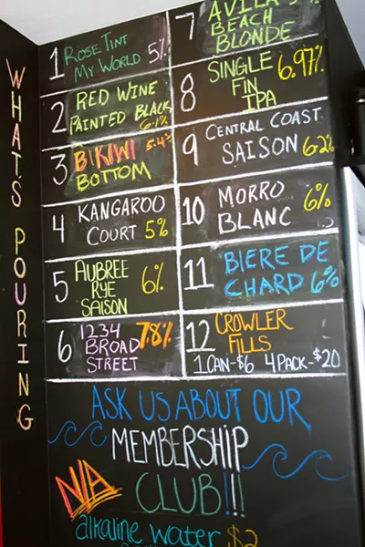 WILD TIDE You will not find seashells or quaint "this way to the beach" ephemera at Libertine's third taproom location. The bold Avila Beach hangout features a dozen taps, video game corner, breezy patio, and quirky vinyl selections. - PHOTO BY HAYLEY THOMAS CAIN