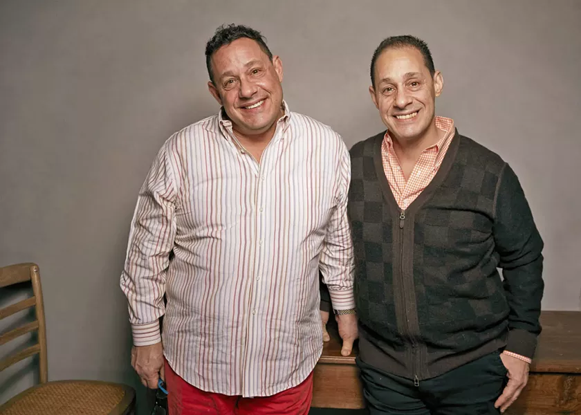 FALLOUT Raised in different families, it soon becomes clear that though physically similar, the brothers—shown here David Kellman (left) and Bobby Shafran—are very different. - PHOTO COURTESY OF RAW