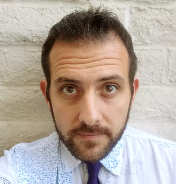 TELL ME A STORY Ryan Miller (above), a former writer and editor for New Times and the Sun, recently published his first book. How to Feed Your Parents is a story about a young girl who learns to cook to inspire her parents to try new foods. - PHOTO COURTESY OF RYAN MILLER