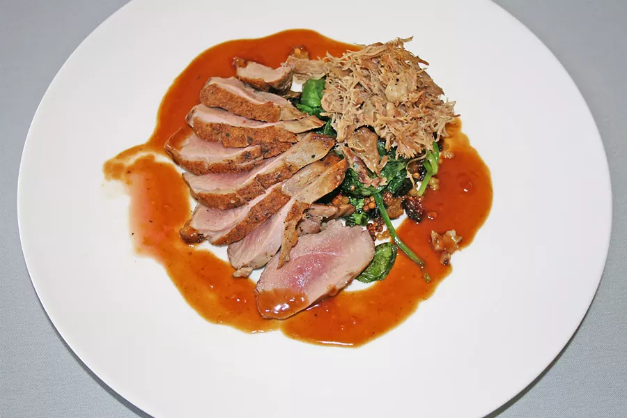 DUCK DUCK OOH You'll want to drag each piece of succulent pan rendered duck breast through its own cardamom cinnamon demi-glace juices. - PHOTO BY HAYLEY THOMAS CAIN