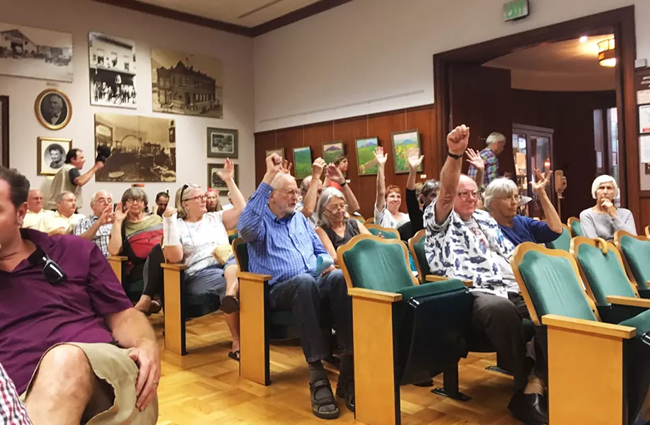 NOT IN MY NEIGHBORHOOD Dozens of SLO residents in the Anholm neighborhood attended a city Planning Commission on Aug. 14 to protest a bike boulevard that would divert vehicle traffic onto Chorro Street. - PHOTO BY PETER JOHNSON