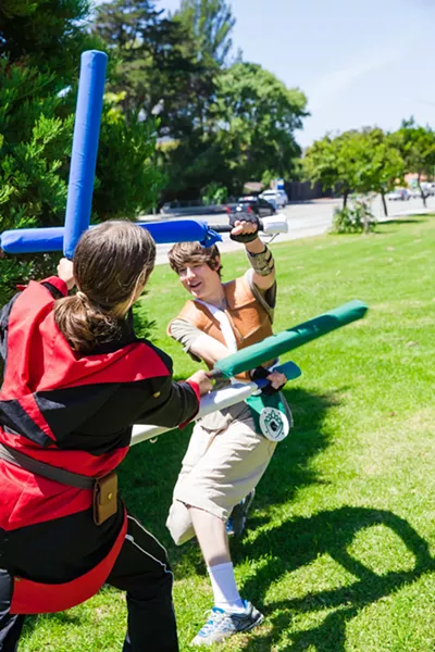 SAY YARP TO LARP Members of the Seven Sleeping Dragons take part in Amtgard, a live action role-playing combat game. - PHOTO BY JAYSON MELLOM