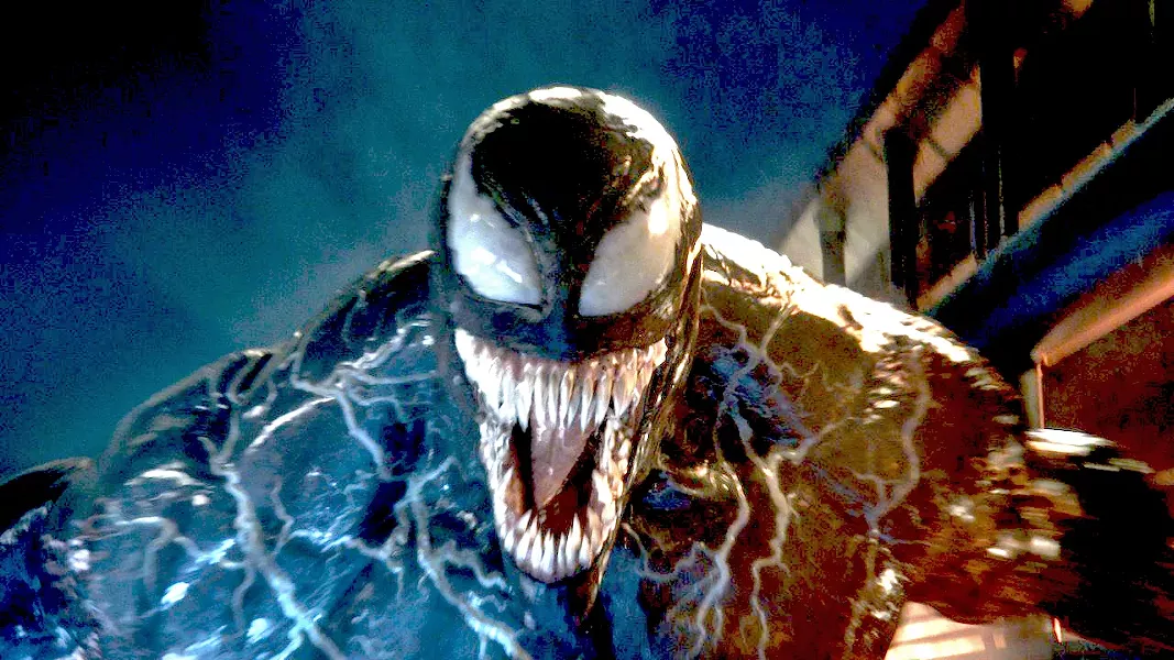SMILE FOR THE CAMERA When a journalist bonds with an alien symbiote, the result is Venom, a powerful hybrid creature played by Tom Hardy in Venom. - PHOTO COURTESY OF COLUMBIA PICTURE CORP.