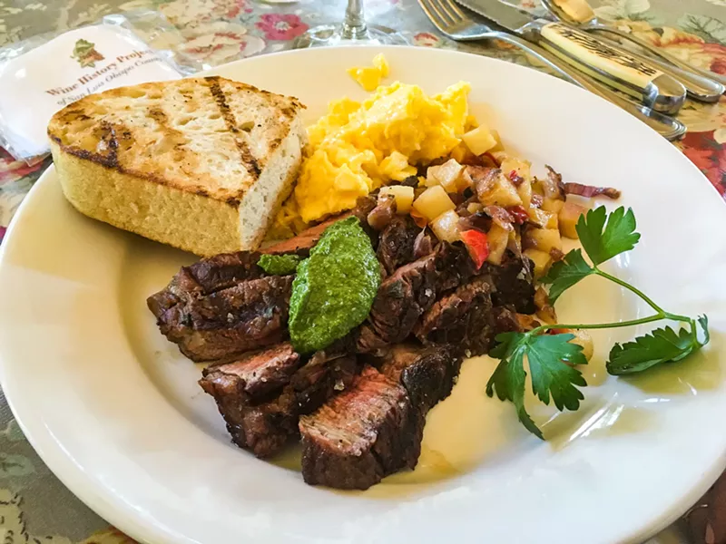 STEAK AND EGGS McPhee's Grill dishes up delicious Sunday brunch during a Wine History Project of SLO County event highlighting chef Ian McPhee and winemaker Gary Eberle's contributions to food and wine on the Central Coast. - PHOTO BY CAMILLIA LANHAM