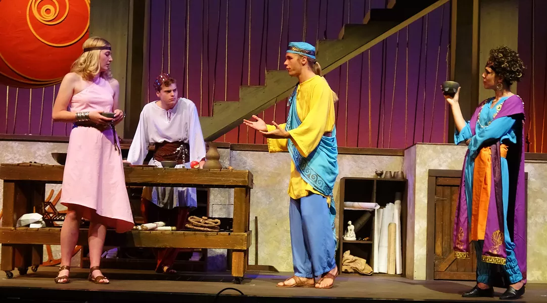 GREAT MINDS Lydia (Marie Althaus), Takus (William Murphy), Phidias (Caleb Winkleblech), and King Minos (Sabrina Harris) discuss the eccentricities of craftsman Daedalus and his chicken-obsessed son, Icarus, in the original play Trust Fall. - PHOTO COURTESY OF AL SCHNUPP