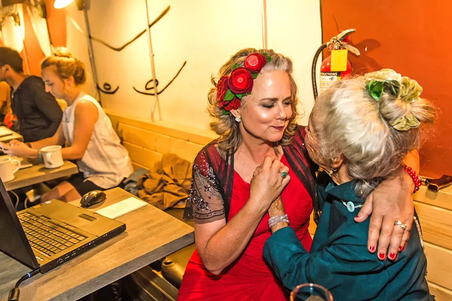VICTORY San Luis Obispo Mayor Heidi Harmon embraces a supporter at Kreuzberg in downtown SLO on Nov. 6, as election results showed she won a landslide victory over T. Keith Gurnee. - PHOTO BY JAYSON MELLOM