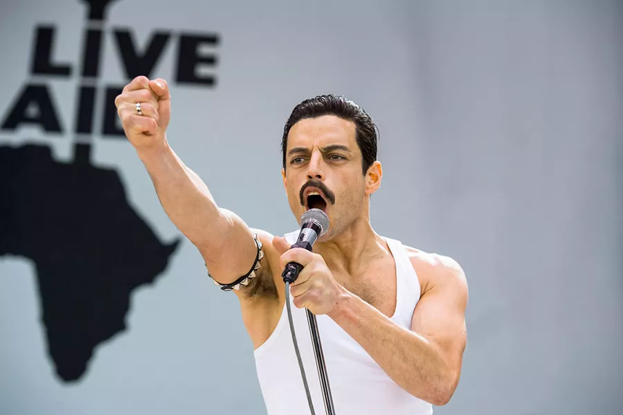 TRIUMPHANT RETURN After leaving Queen for an ill-fated solo career, Freddie Mercury (Rami Malek) and Queen re-formed in time to play the historic 1985 Live Aid concert. - PHOTO COURTESY OF NEW REGENCY PICTURES