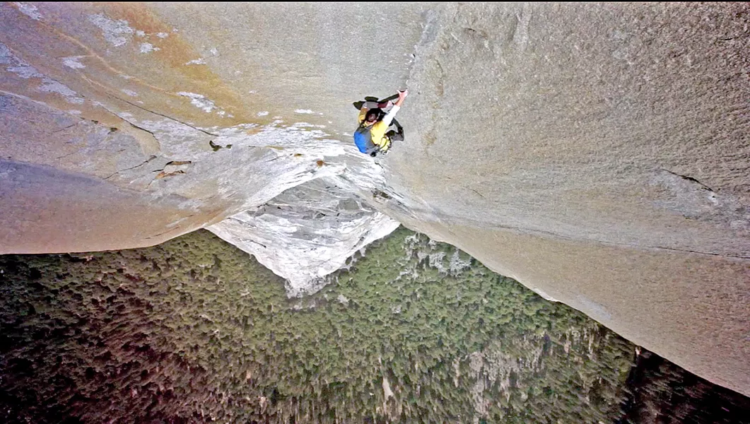 CLIMBING UP A rock climber ascends a granite face in Yosemite National Park in the film Valley Uprising, which will be featured on Nov. 29 as part of EcoWatch! Movie Nights at Green Goods in San Luis Obispo. - PHOTO COURTESY OF SENDER FILMS