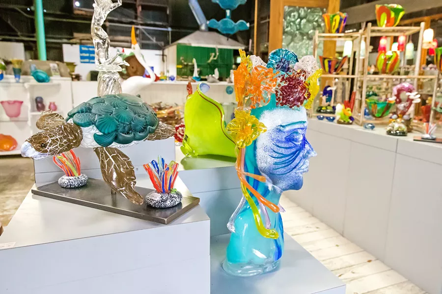 BRIGHTLY COLORED GLASS Eric Dandurand offers a special kind of gift this holiday season, the gift of blown-glass goods. - PHOTO BY JAYSON MELLOM