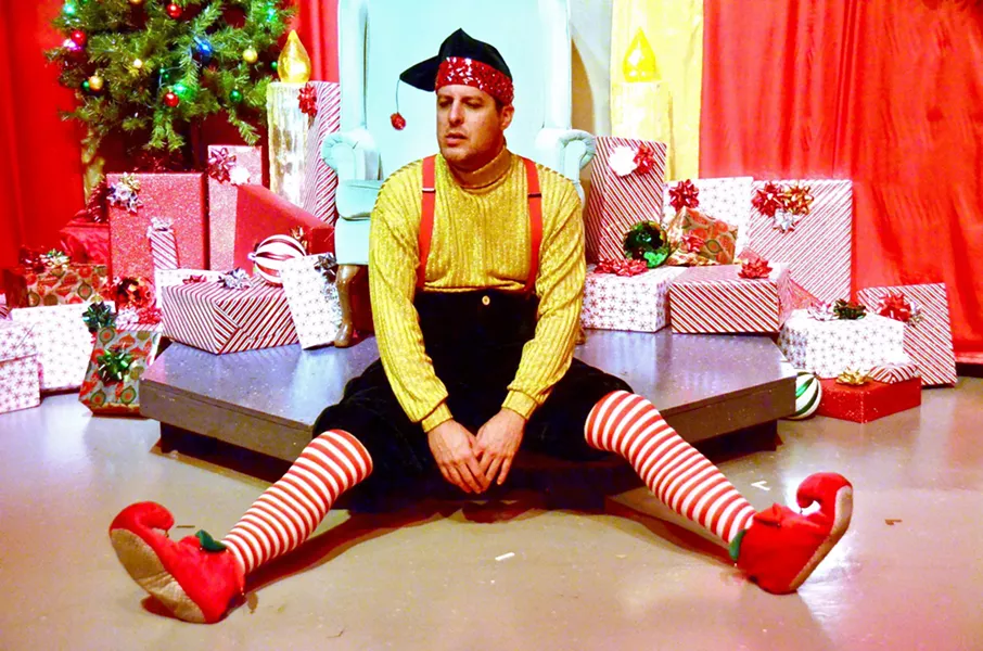 ELF DOWN SLO Repertory Theatre's Kevin Harris stars as Crumpet, a man moonlighting as an elf in Santa's village at Macy's. - PHOTOS COURTESY OF THE SLO REPERTORY THEATRE