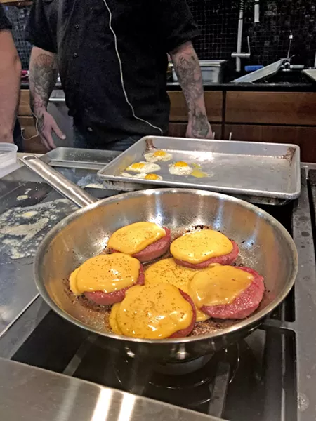 PROUD TO BE AMERICAN Melted gourmet American cheese and bologna (crafted by Chef Jacob Town of The Spoon Trade in Grover Beach, but cooked by radio duo The Cork Dorks) receive a moment in the spotlight. - PHOTOS BY HAYLEY THOMAS CAIN