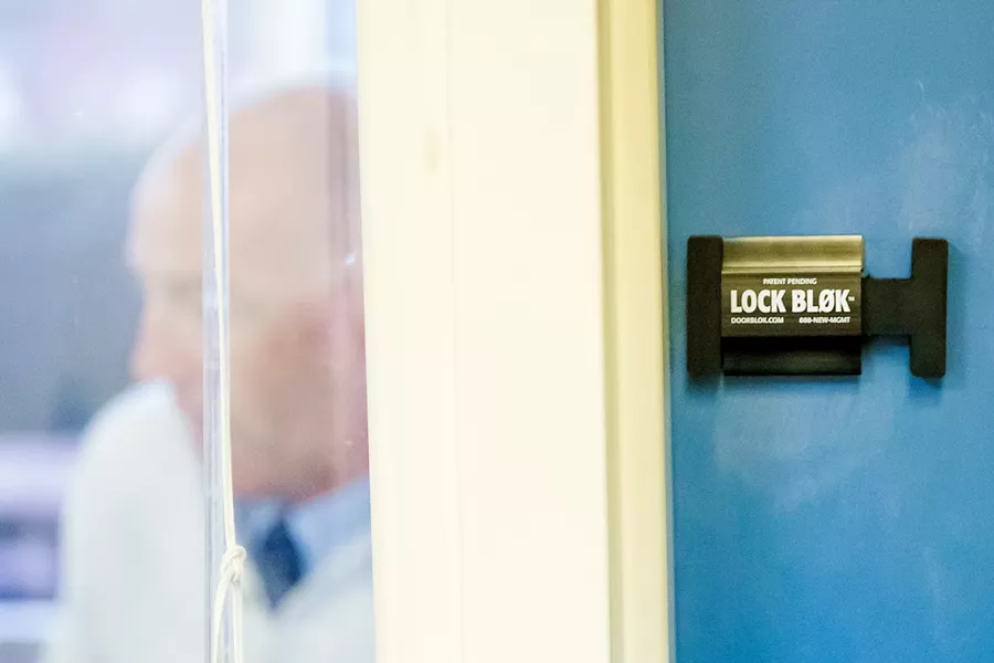 SHUT TIGHT Three years ago, a former educator created the Lock Blok, a tool to lock classroom doors from the inside rather than traditionally locking them from the outside. - PHOTOS BY JAYSON MELLOM
