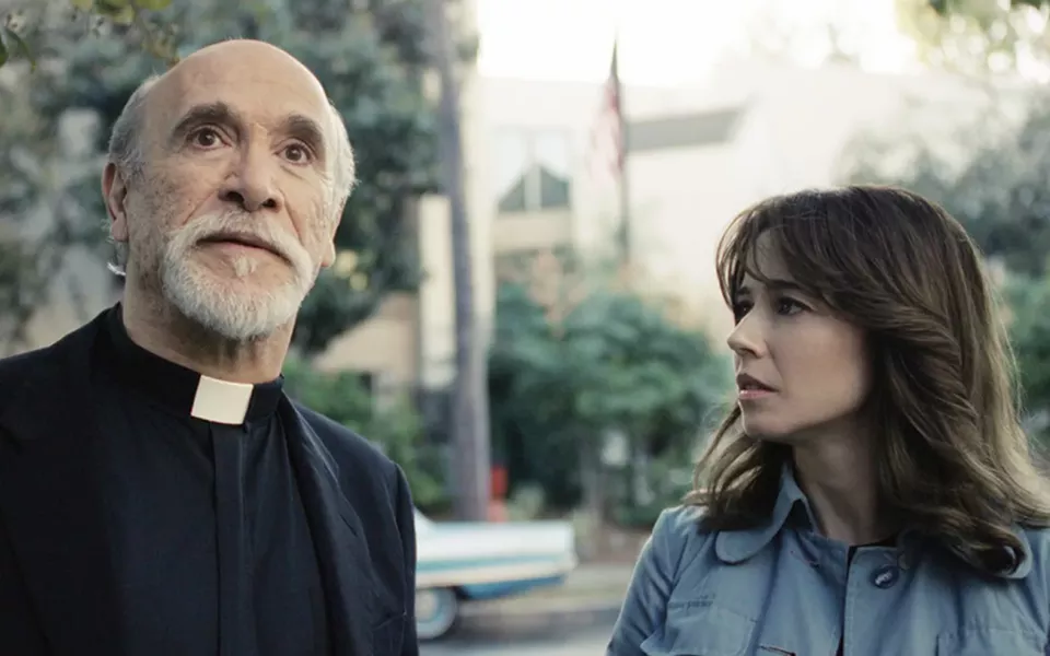 CURSED When an evil entity threatens her children, Anna Tate-Garcia (Linda Cardellini, right) turns to Father Perez (Tony Amendola) for help, in The Curse of La Llorona. - PHOTO COURTESY OF NEW LINE CINEMA