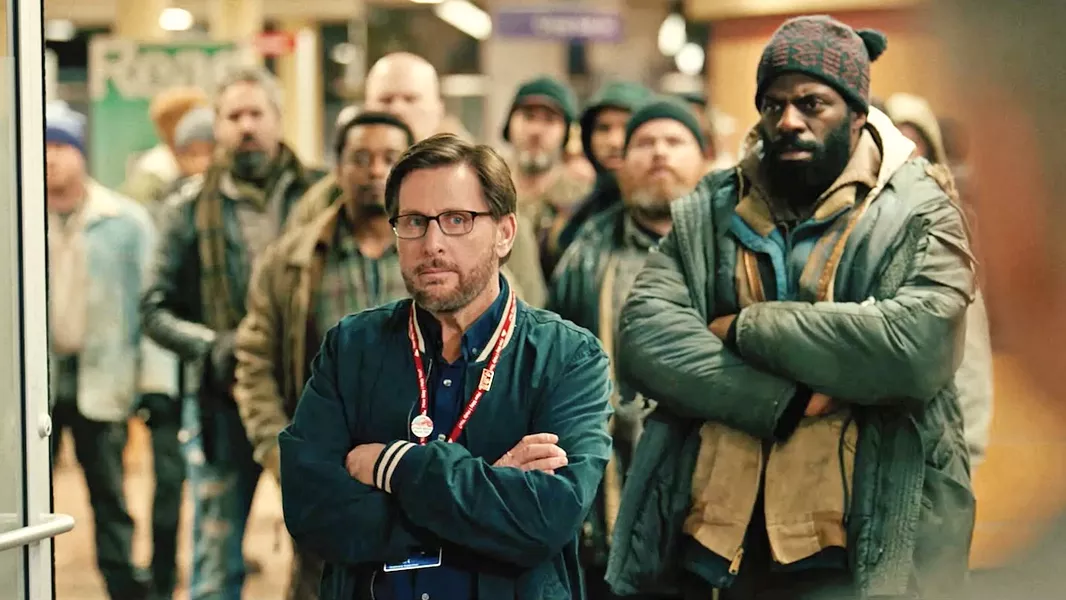 CIVIL DISOBEDIENCE Writer-director-actor Emilio Estevez (center) helms The Public, a drama about homeless people who take over the Cincinnati public library during a cold snap. - PHOTO COURTESY OF HAMMERSTONE STUDIOS